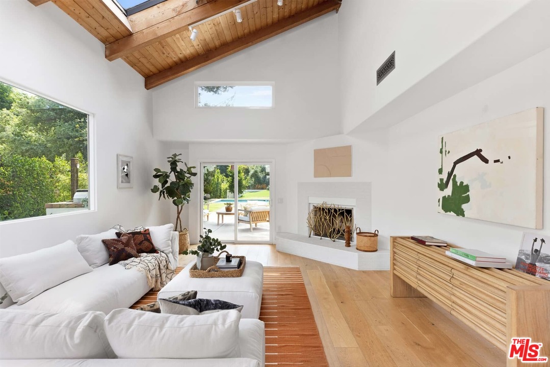 1435 Crest Drive Altadena, CA 91001 - Photo 4 of 54 a living room with furniture fireplace and potted plants