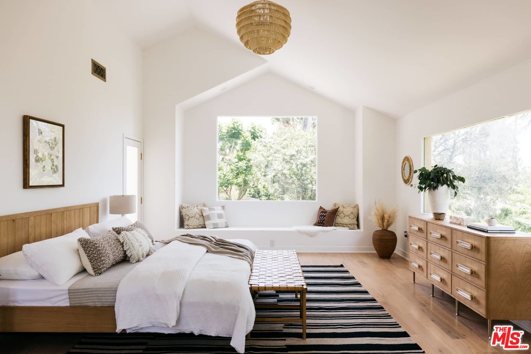 1435 Crest Drive Altadena, CA 91001 - Photo 33 of 54 a bedroom with a bed and a window