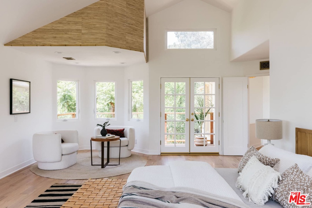 1435 Crest Drive Altadena, CA 91001 - Photo 36 of 54 a bedroom with furniture and a window