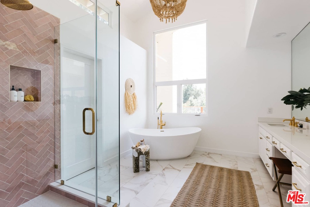 1435 Crest Drive Altadena, CA 91001 - Photo 40 of 54 a bath room with a sink and a mirror