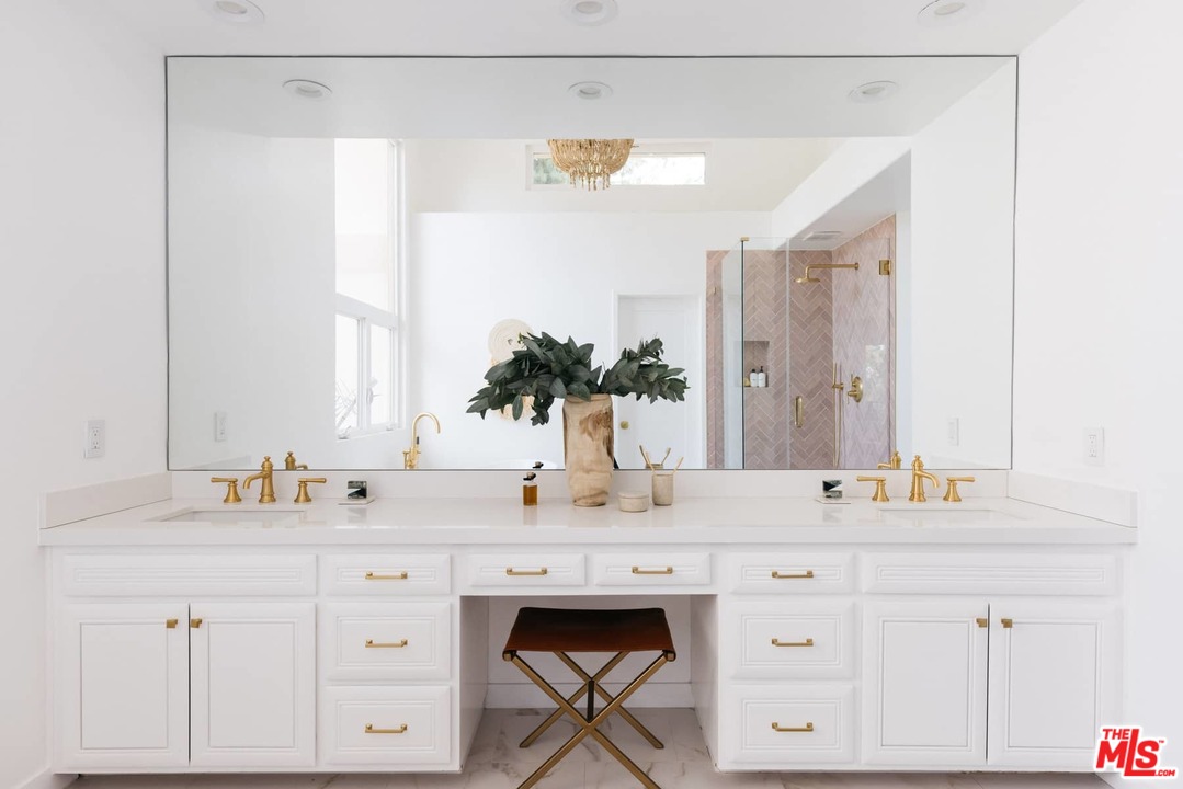 1435 Crest Drive Altadena, CA 91001 - Photo 43 of 54 a bathroom with a sink and a mirror