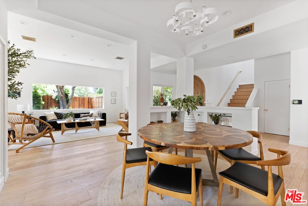 1435 Crest Drive Altadena, CA 91001 - Photo 49 of 54 a view of a dining room with furniture and wooden floor
