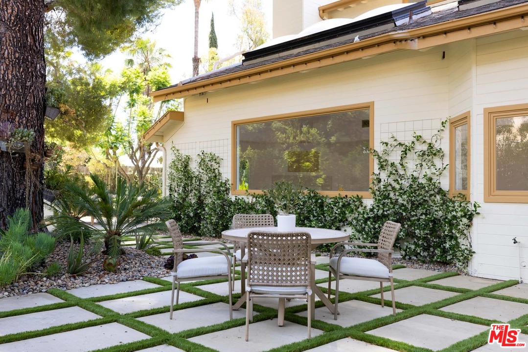 1435 Crest Drive Altadena, CA 91001 - Photo 6 of 54 a patio with table and chairs and potted plants