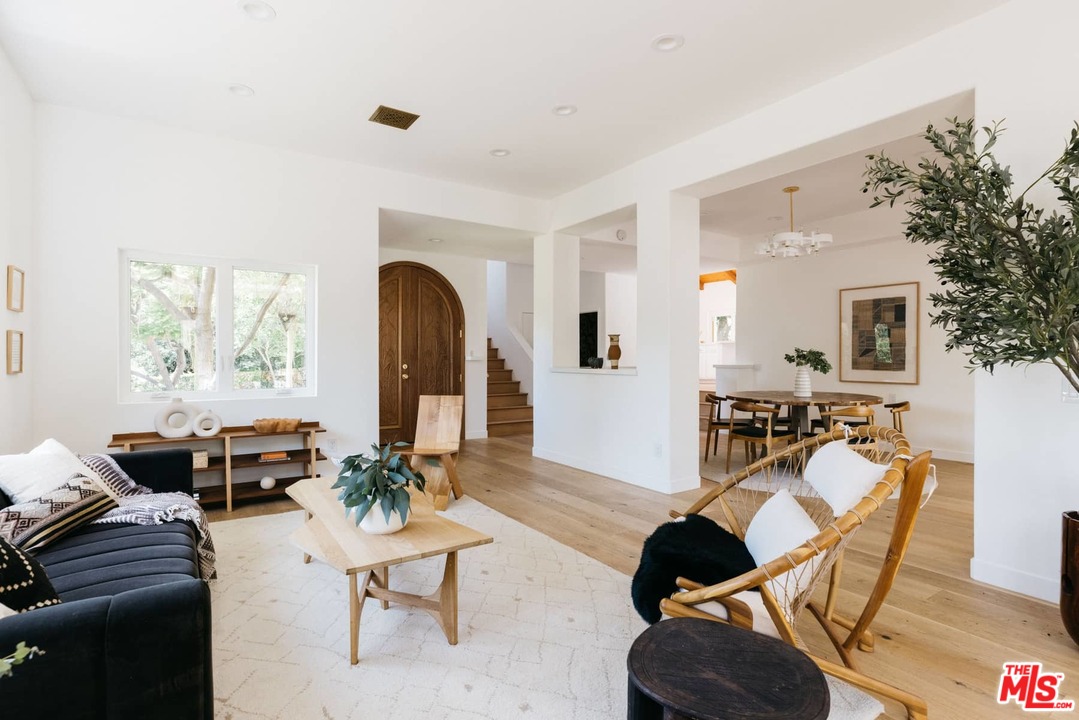 1435 Crest Drive Altadena, CA 91001 - Photo 51 of 54 a living room with furniture or couch and a potted plant