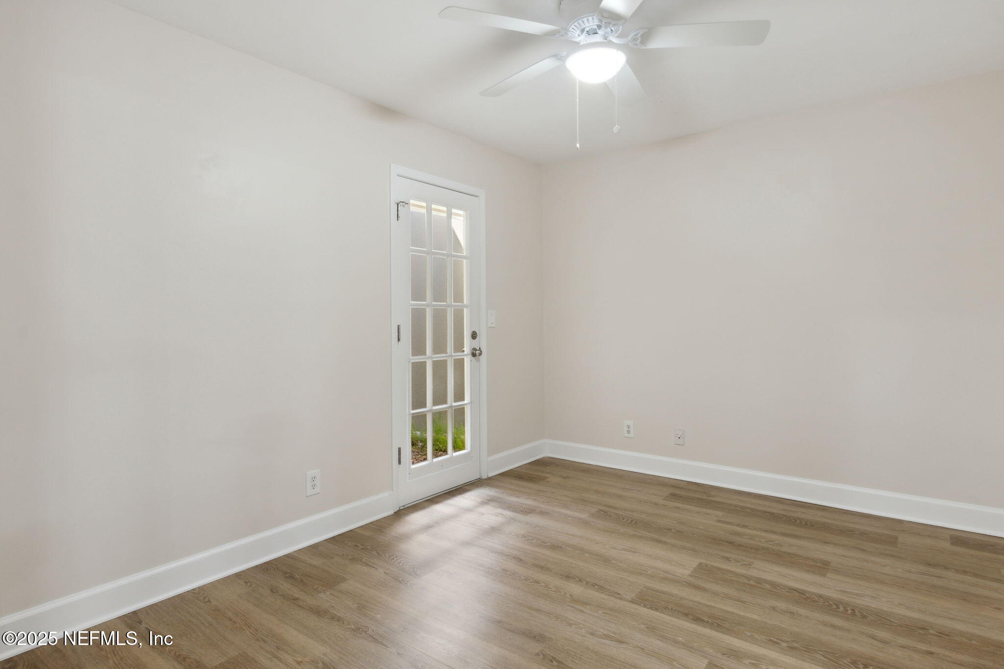 14 Turtleback Trail Ponte Vedra Beach, FL 32082 - Photo 21 of 63 an empty room with wooden floor and windows