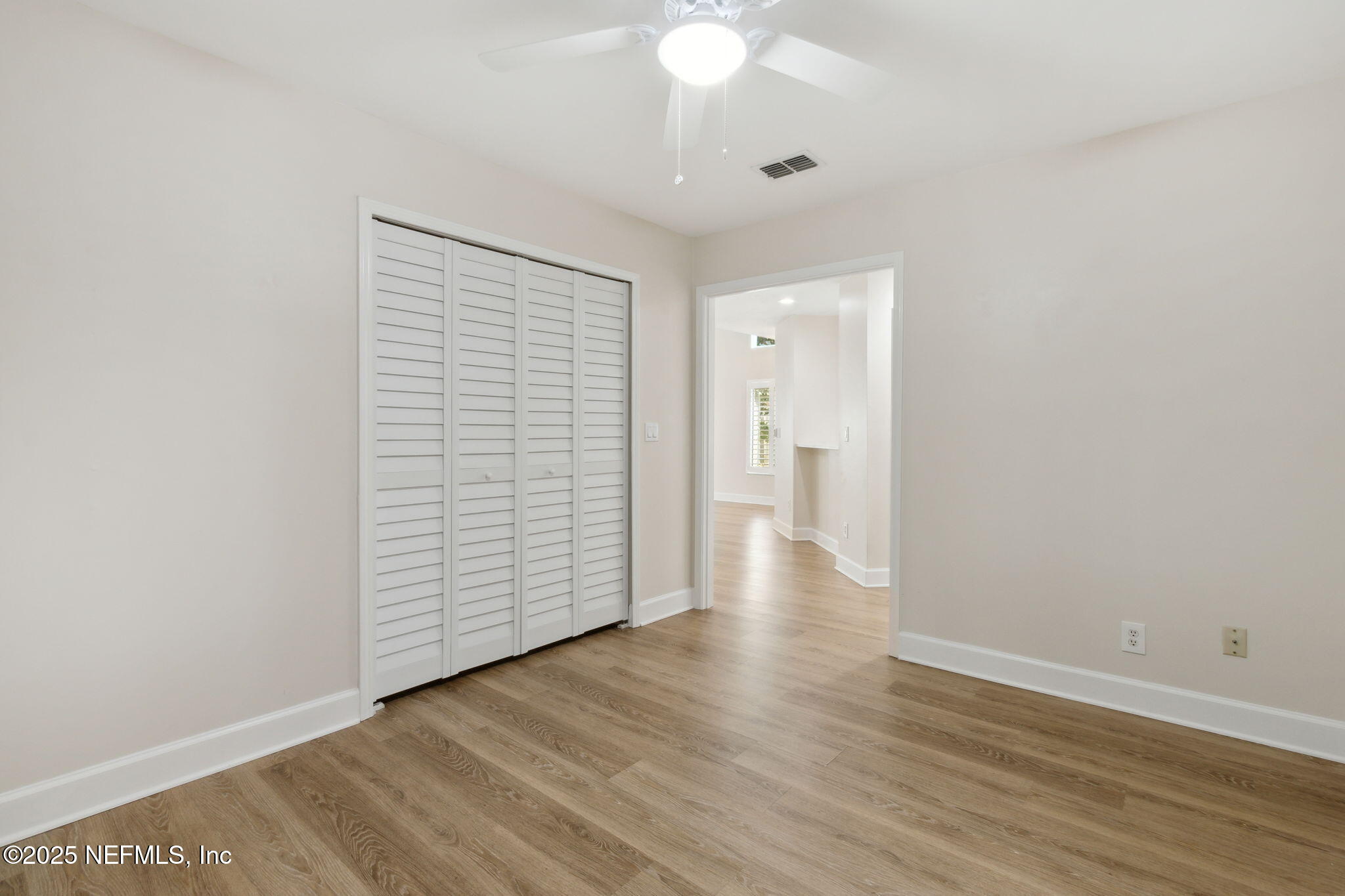14 Turtleback Trail Ponte Vedra Beach, FL 32082 - Photo 22 of 63 a view of an empty room with wooden floor and a window