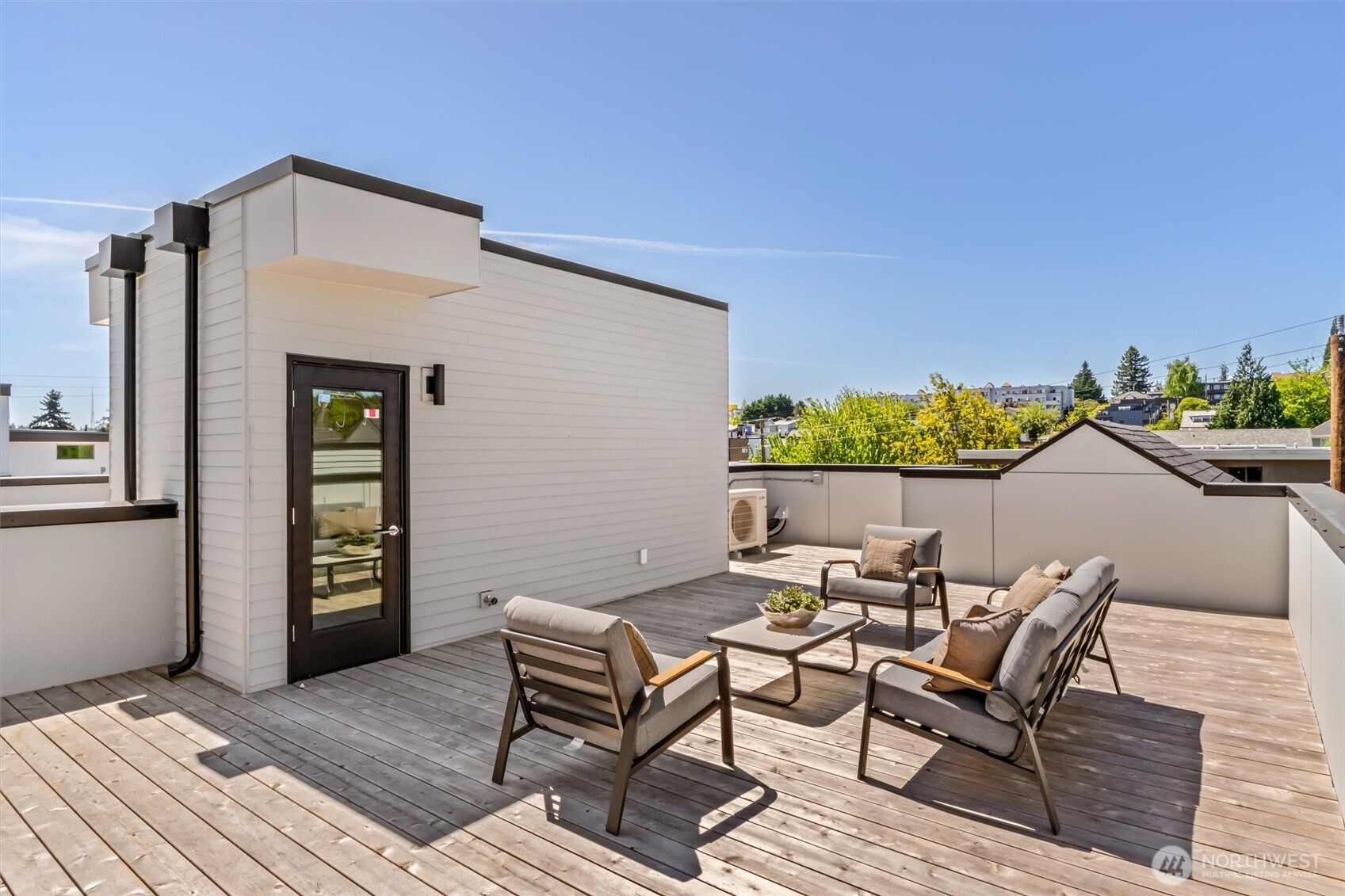 4460 Midvale Avenue North Seattle, WA 98103 - Photo 37 of 40 a terrace of a house with outdoor seating