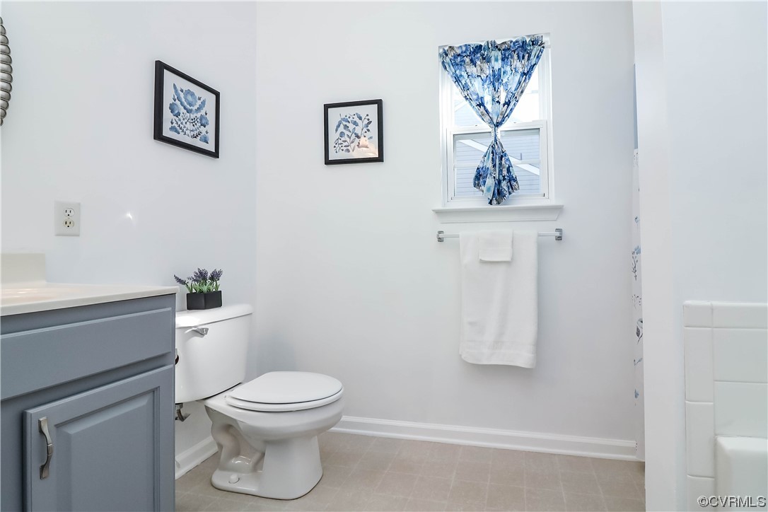 9219 Alcove Grove Road Chesterfield, VA 23832 - Photo 27 of 41 a bathroom with a toilet and a shower