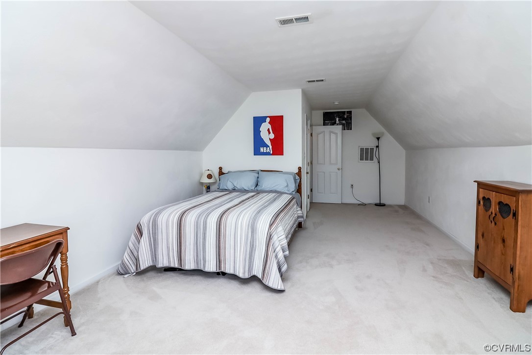 9219 Alcove Grove Road Chesterfield, VA 23832 - Photo 32 of 41 a bedroom with a bed and a desk