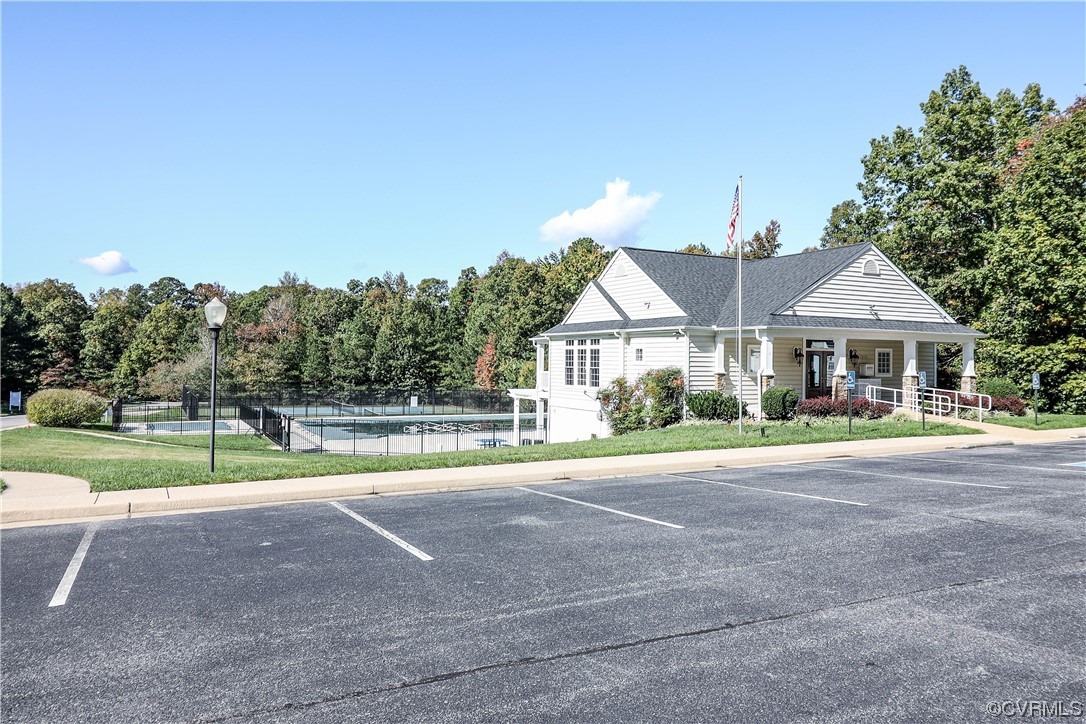 9219 Alcove Grove Road Chesterfield, VA 23832 - Photo 41 of 41 a front view of house with yard and trees in the background