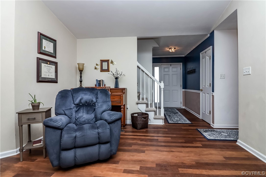 9219 Alcove Grove Road Chesterfield, VA 23832 - Photo 10 of 41 a living room with furniture and a wooden floor