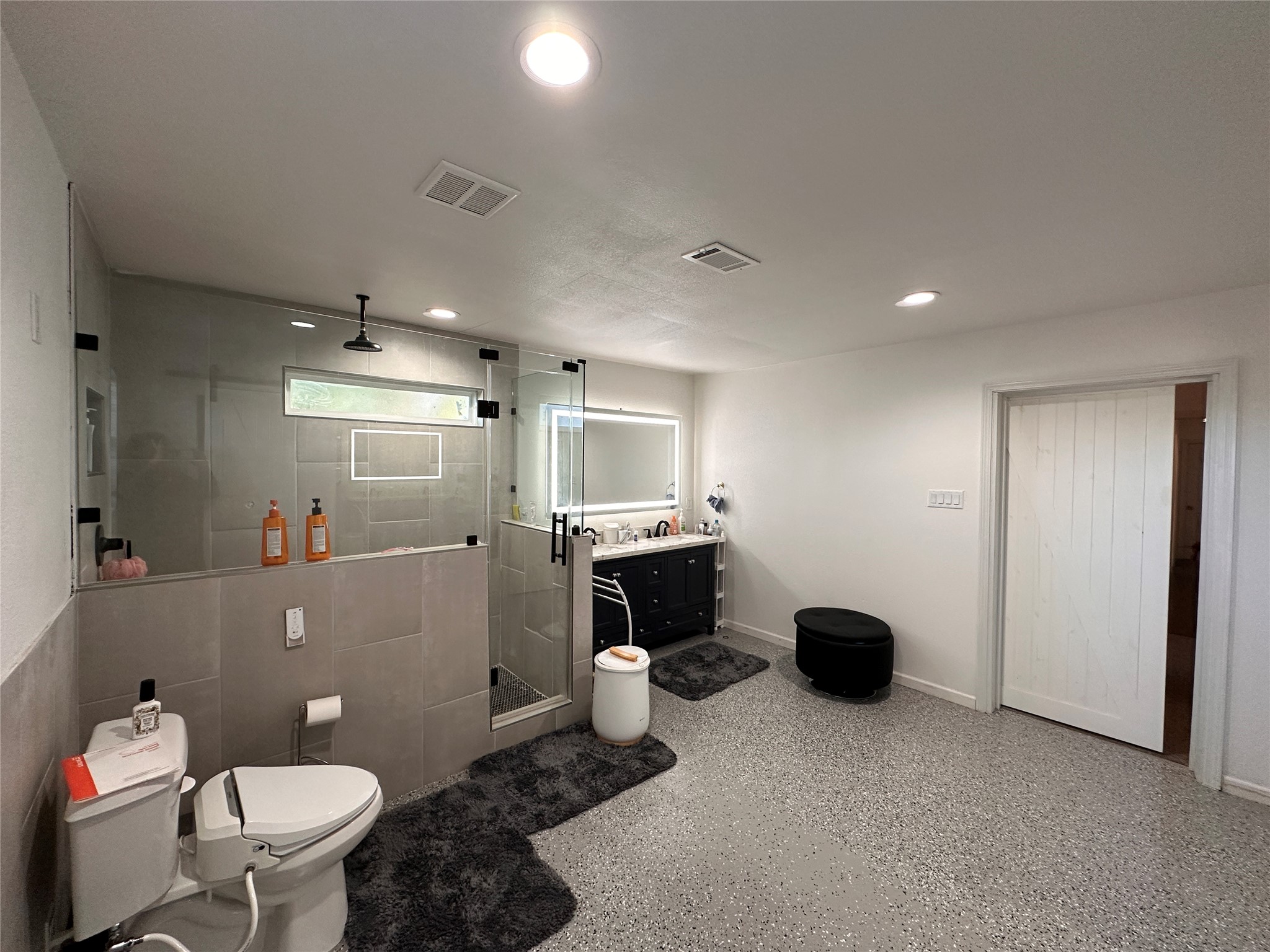 26 Lyncrest Drive Galveston, TX 77550 - Photo 12 of 36 Toilet with heated bidet seat
