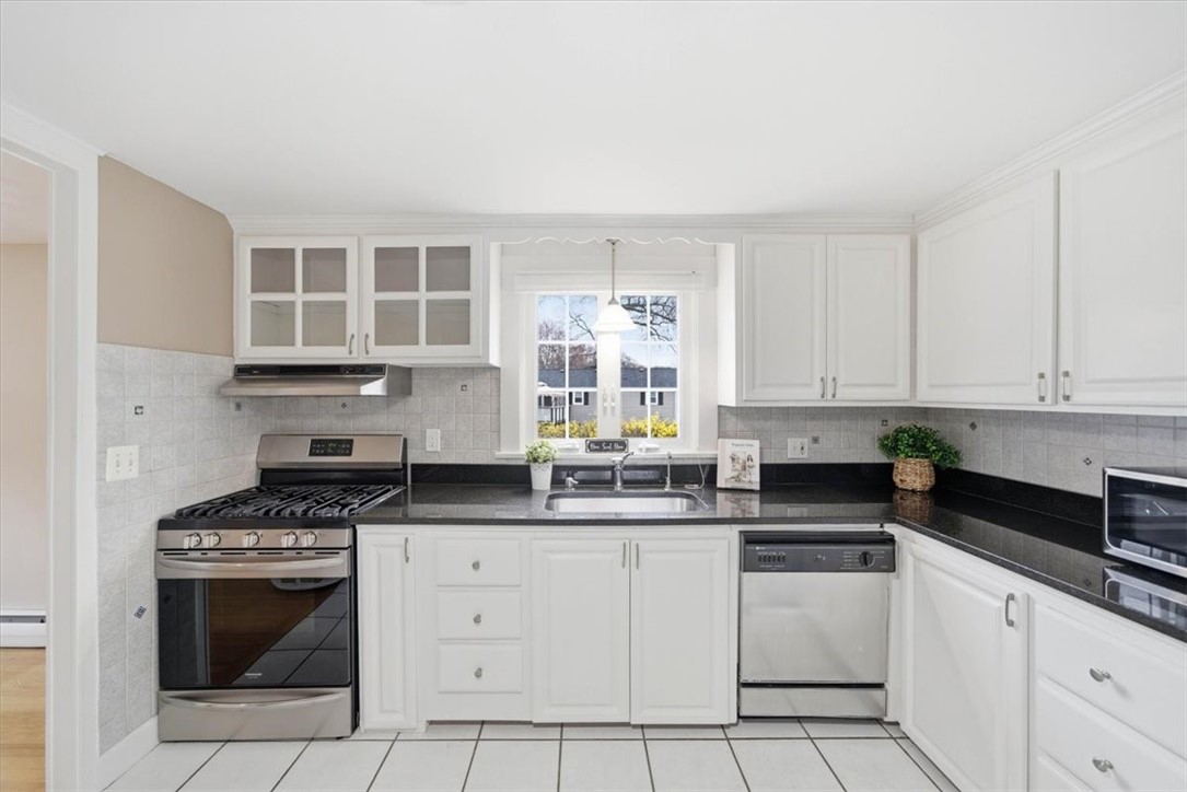 28 Glenbrook Road Warwick, RI 02889 - Photo 12 of 43 The kitchen has all the appliances plus a nice large sink with a window looking out to the backyard.