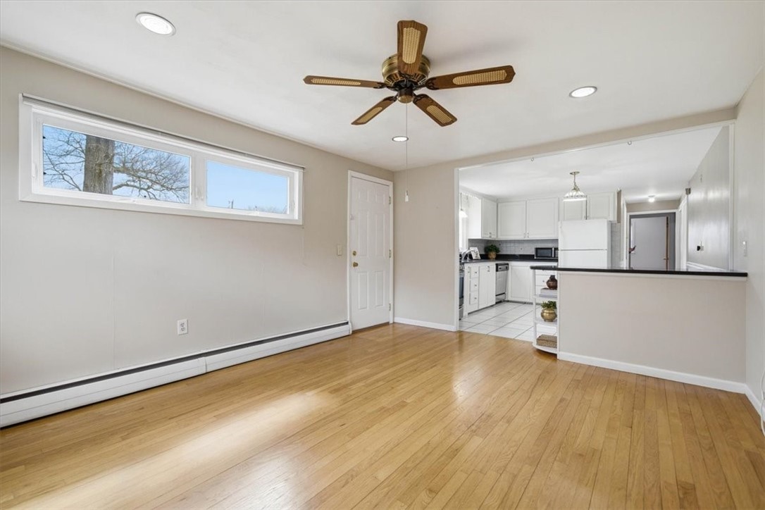 28 Glenbrook Road Warwick, RI 02889 - Photo 16 of 43 View of the kitchen and exit door to the backyard from the Dining Room