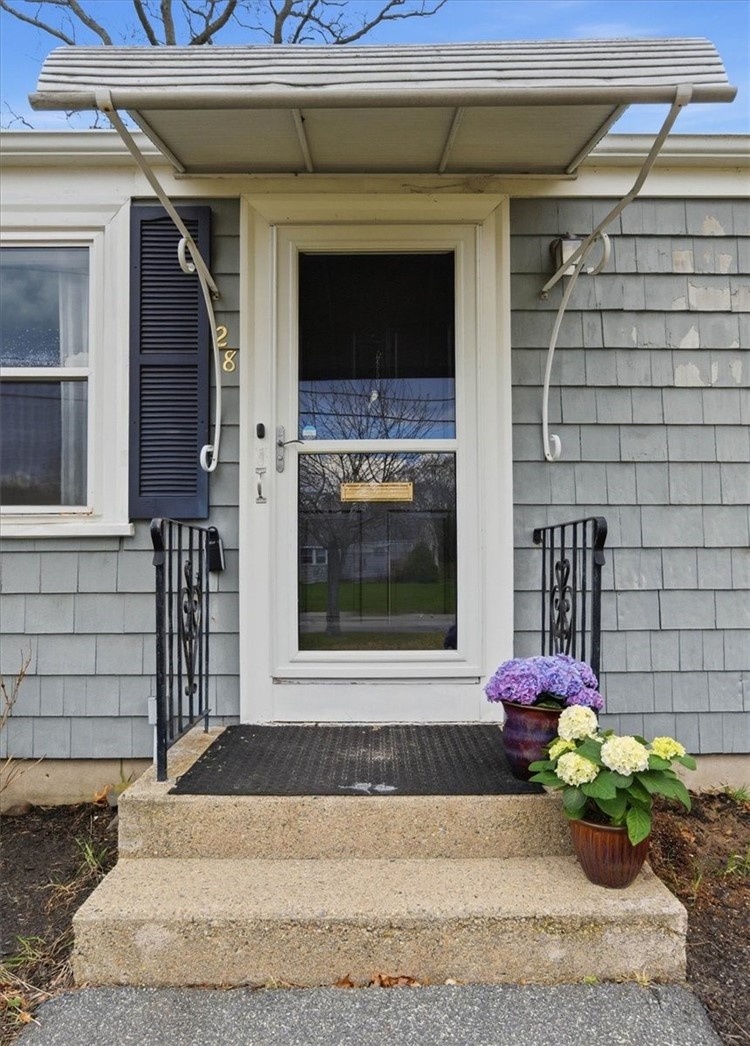 28 Glenbrook Road Warwick, RI 02889 - Photo 4 of 43 Covered front door entrance with storm door.