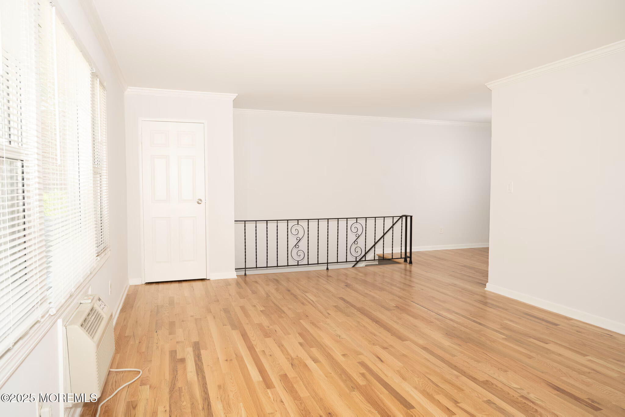 1218 Allaire Road, Unit 1908B Spring Lake, NJ 07762 - Photo 10 of 10 a view of a room with wooden floor