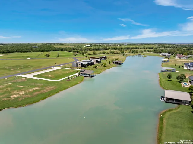 a view of a street with a yard