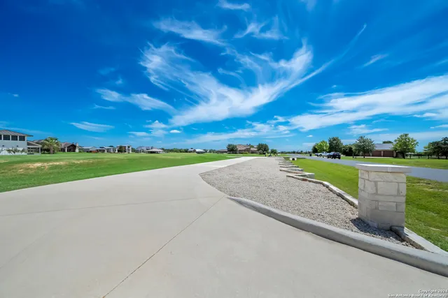 a view of a lake with a city