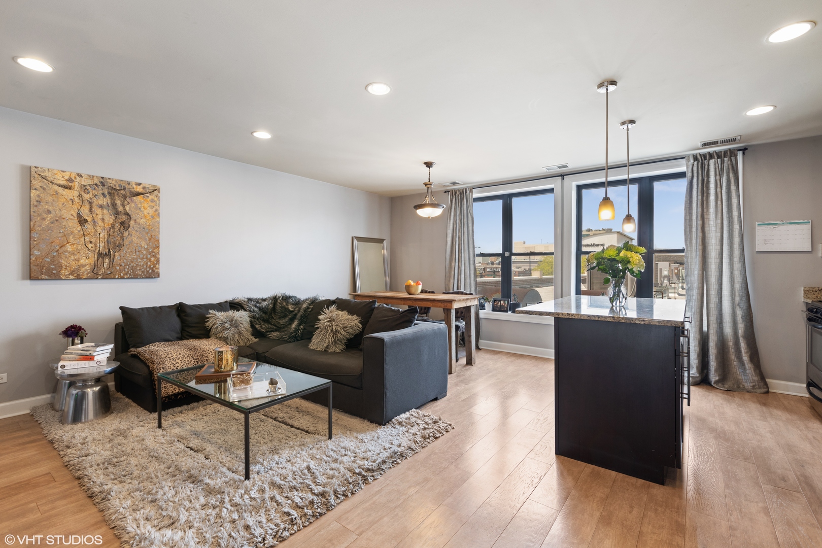 1600 North Halsted Street, Unit 2J Chicago, IL 60614 - Photo 7 of 11 a living room with furniture and a window