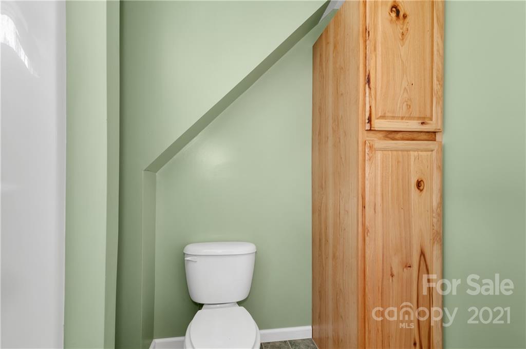 6144 Soco Road Maggie Valley, NC 28751 - Photo 19 of 23 a bathroom with a toilet and a shower