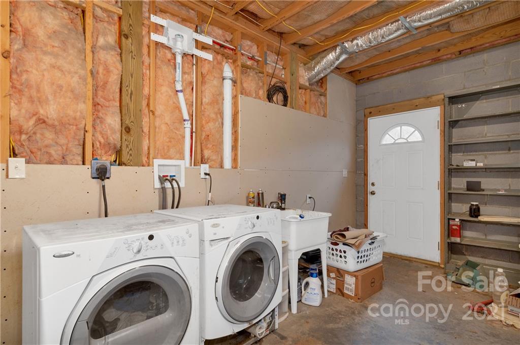 6144 Soco Road Maggie Valley, NC 28751 - Photo 20 of 23 a utility room with dryer and washer