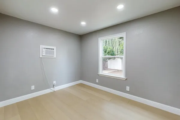 an empty room with windows