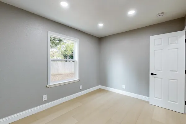 a bathroom with a bathtub and a sink