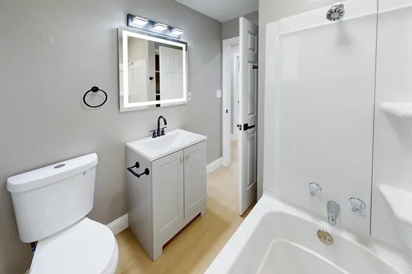 a view of storage and utility room with washer and dryer