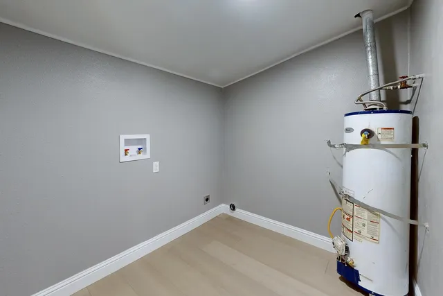 a view of a hallway with a livingroom and a gallery