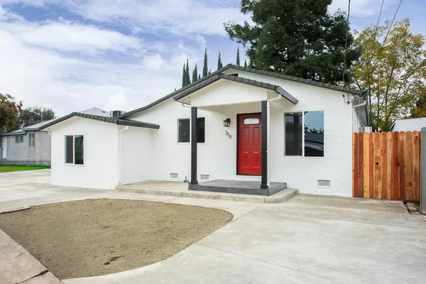 a front view of a house with a garage
