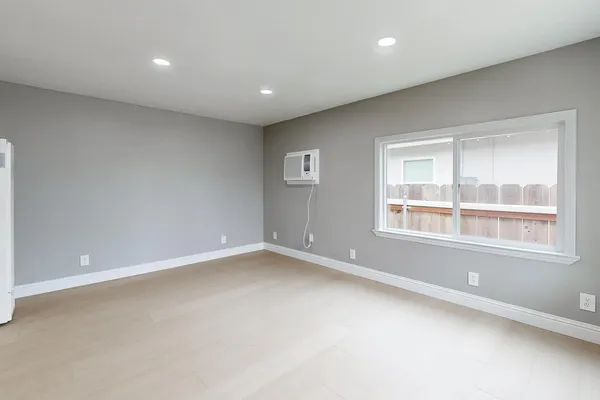 an empty room with a window