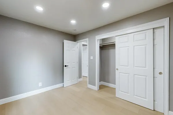 a backyard of a house with lots of green space