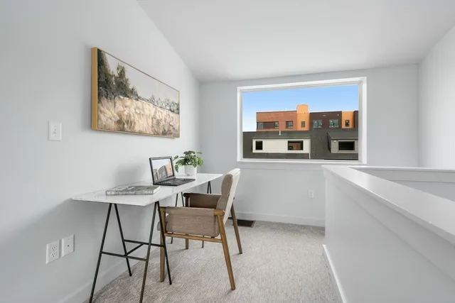 a room with a table and chairs