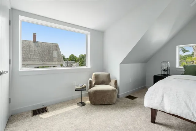 a bedroom with furniture and a couch