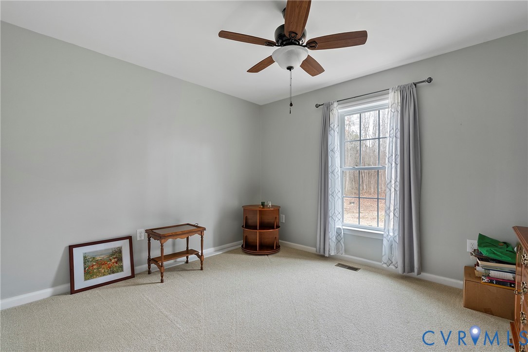 6115 Prospect Road Gloucester, VA 23061 - Photo 22 of 49 a view of an empty room with a window