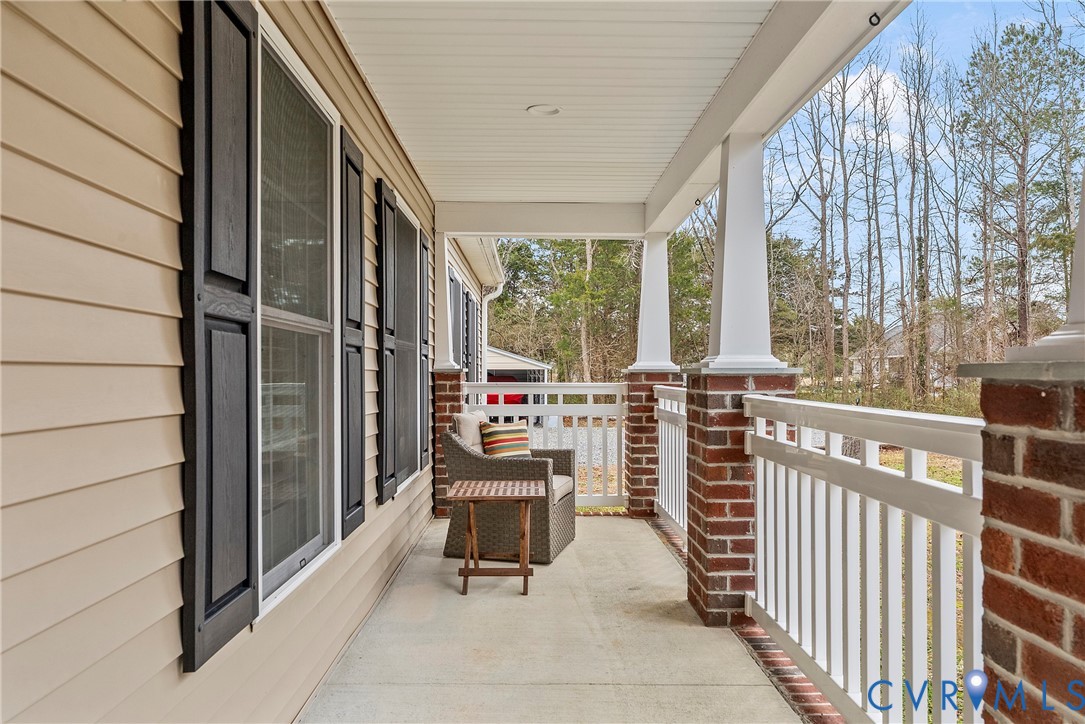 6115 Prospect Road Gloucester, VA 23061 - Photo 3 of 49 a view of a chairs and tables in the balcony