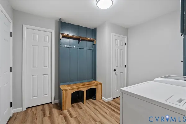 a bedroom with a bed and a cabinet