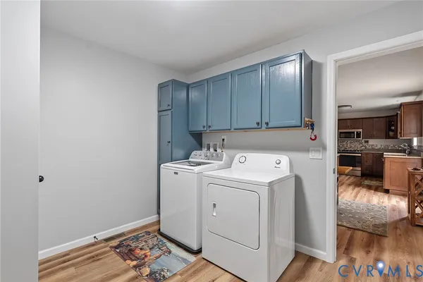 a view of a storage & utility room with washer and dryer