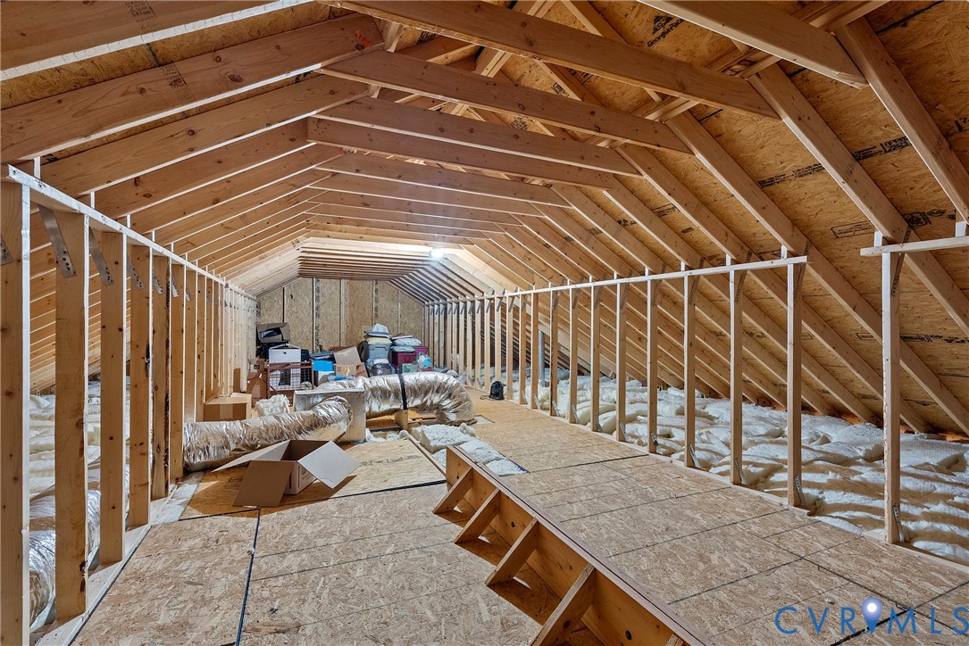 6115 Prospect Road Gloucester, VA 23061 - Photo 35 of 49 a view of a porch with furniture and floor to ceiling window