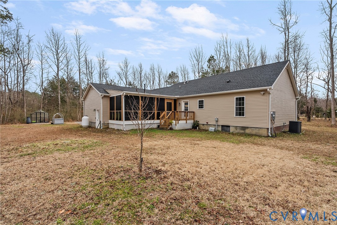 6115 Prospect Road Gloucester, VA 23061 - Photo 40 of 49 a view of a house with a yard