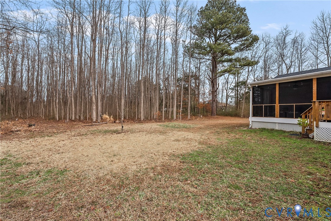 6115 Prospect Road Gloucester, VA 23061 - Photo 41 of 49 a backyard of a house with barbeque oven
