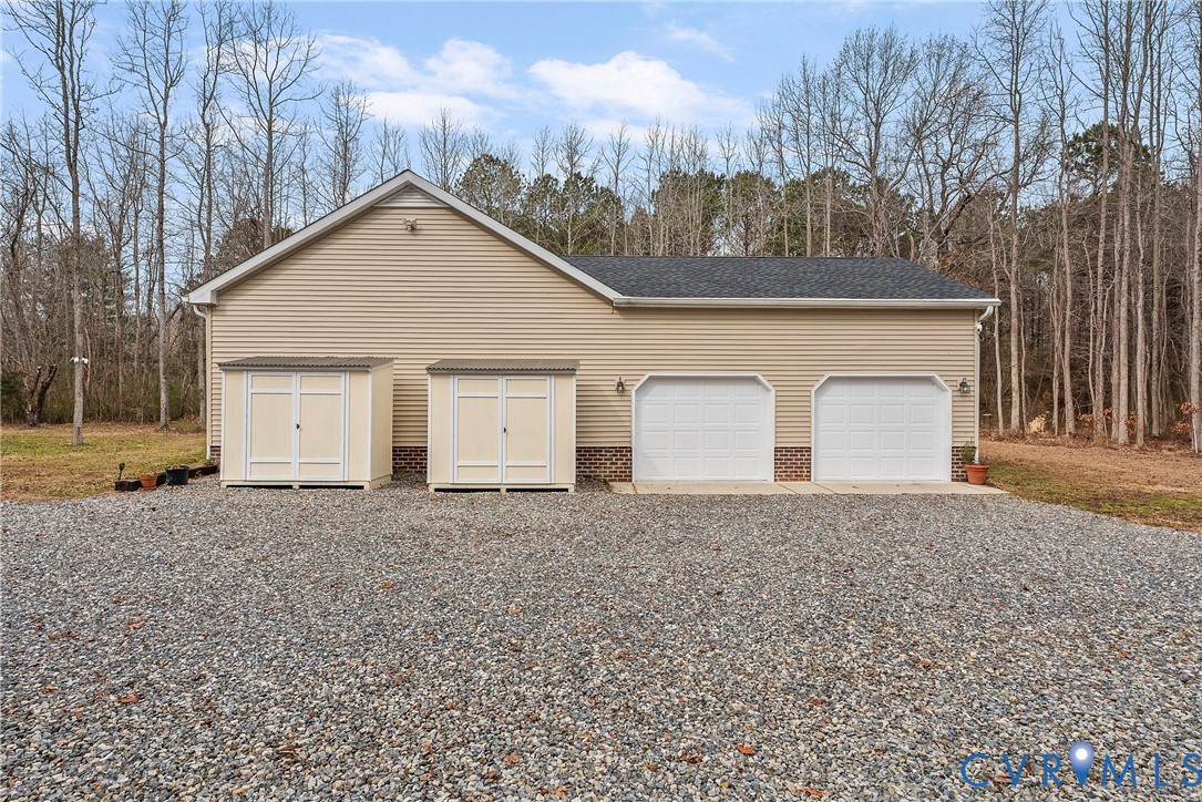 6115 Prospect Road Gloucester, VA 23061 - Photo 48 of 49 a view of house with garage and yard