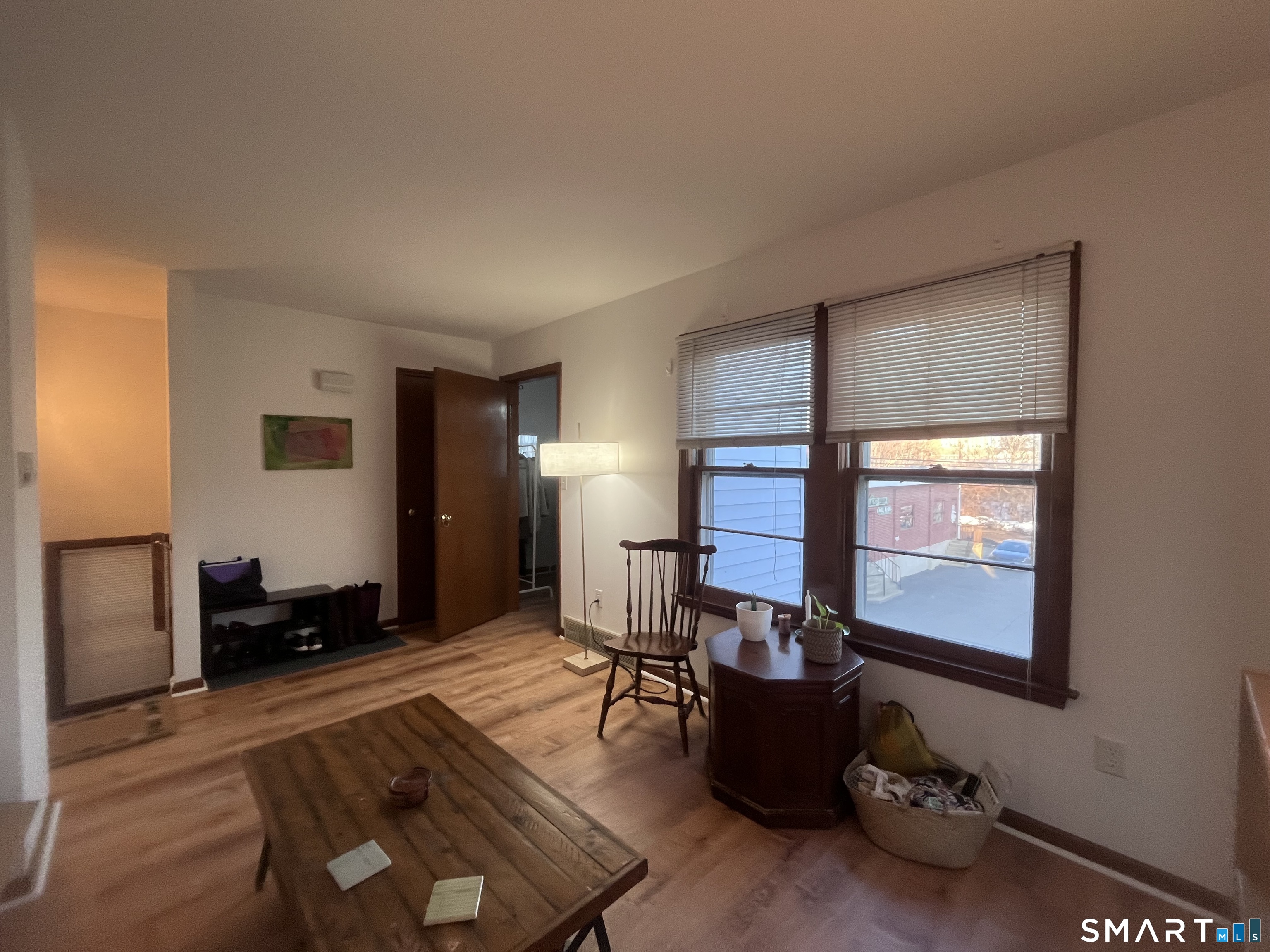 124 Thorpe Street Fairfield, CT 06824 - Photo 6 of 23 a living room with furniture and a window