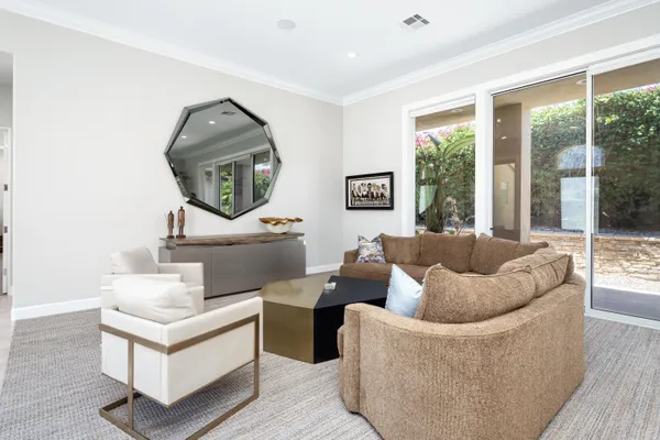 a bathroom with a sink double vanity and a mirror