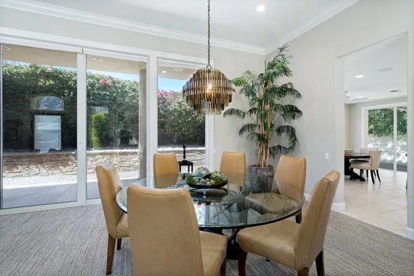 a utility room with sink dryer and washer