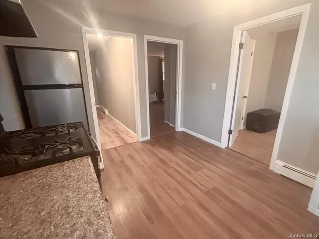 a bedroom with a bed and ceiling fan