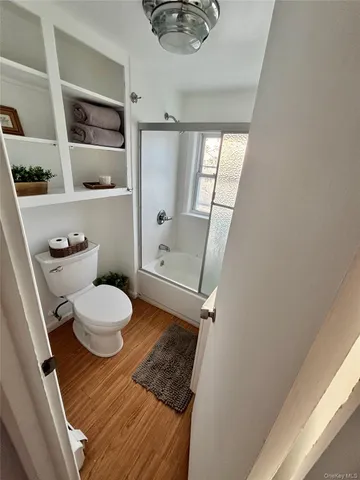 a view of a backyard with large trees