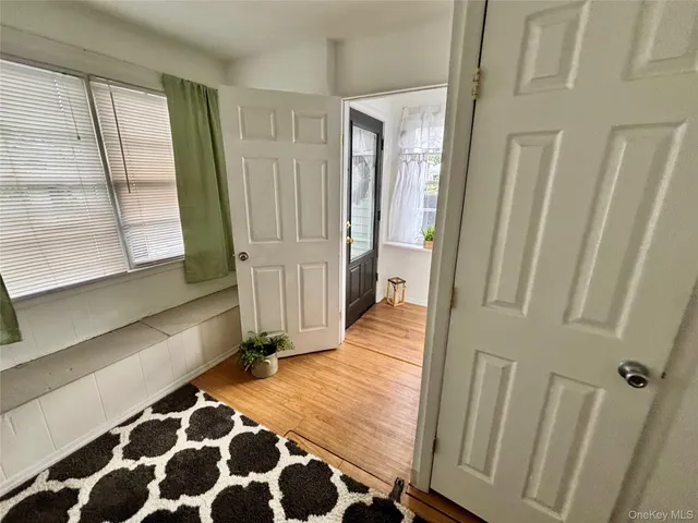 a view of a backyard with sitting area