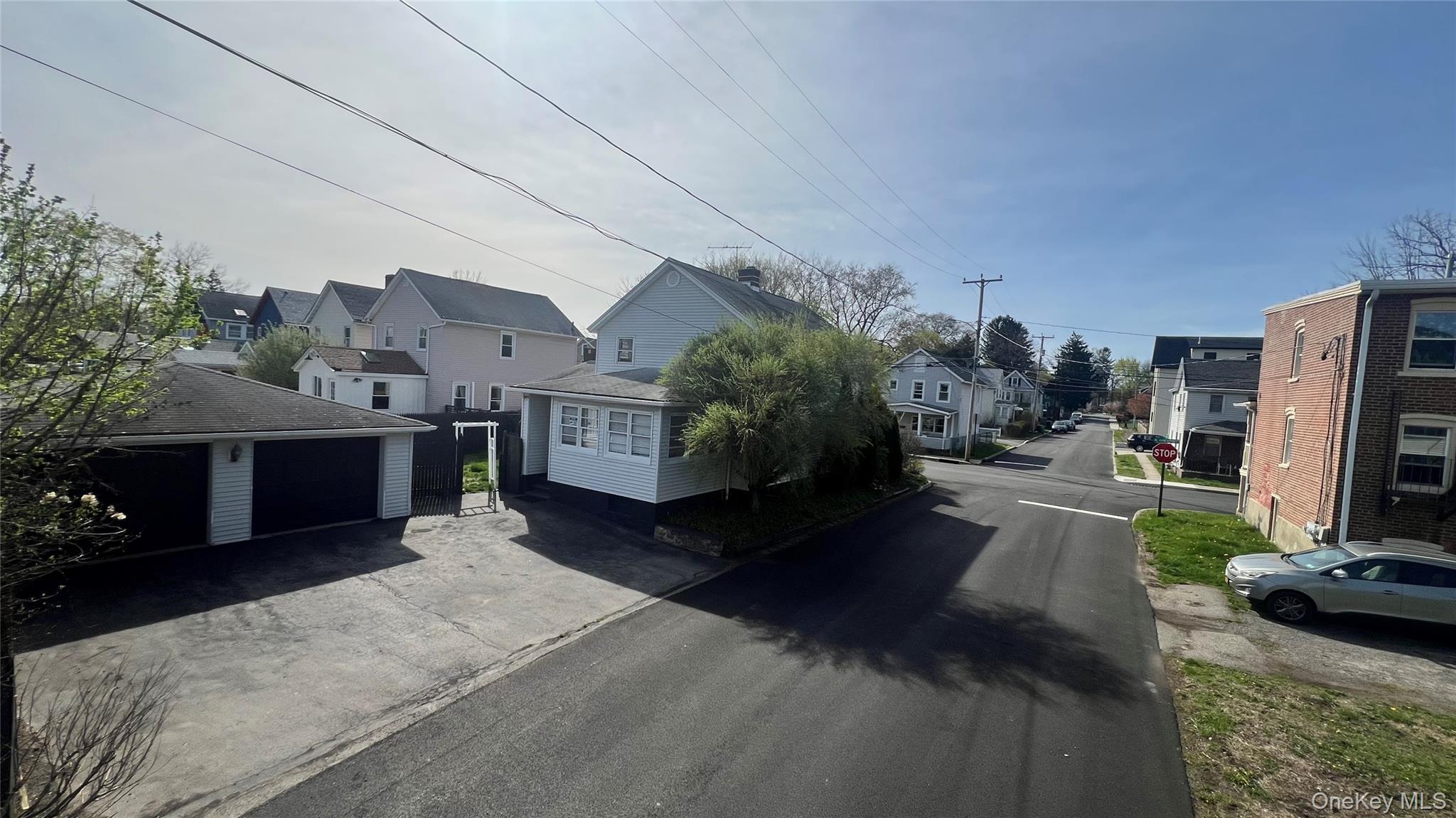 49 North Chestnut Street Beacon, NY 12508 - Photo 39 of 41 View of asphalt street featuring a residential view and traffic signs