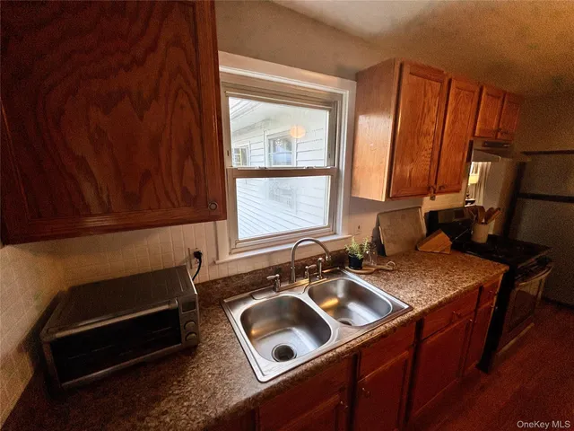 a bathroom with a sink toilet and vanity